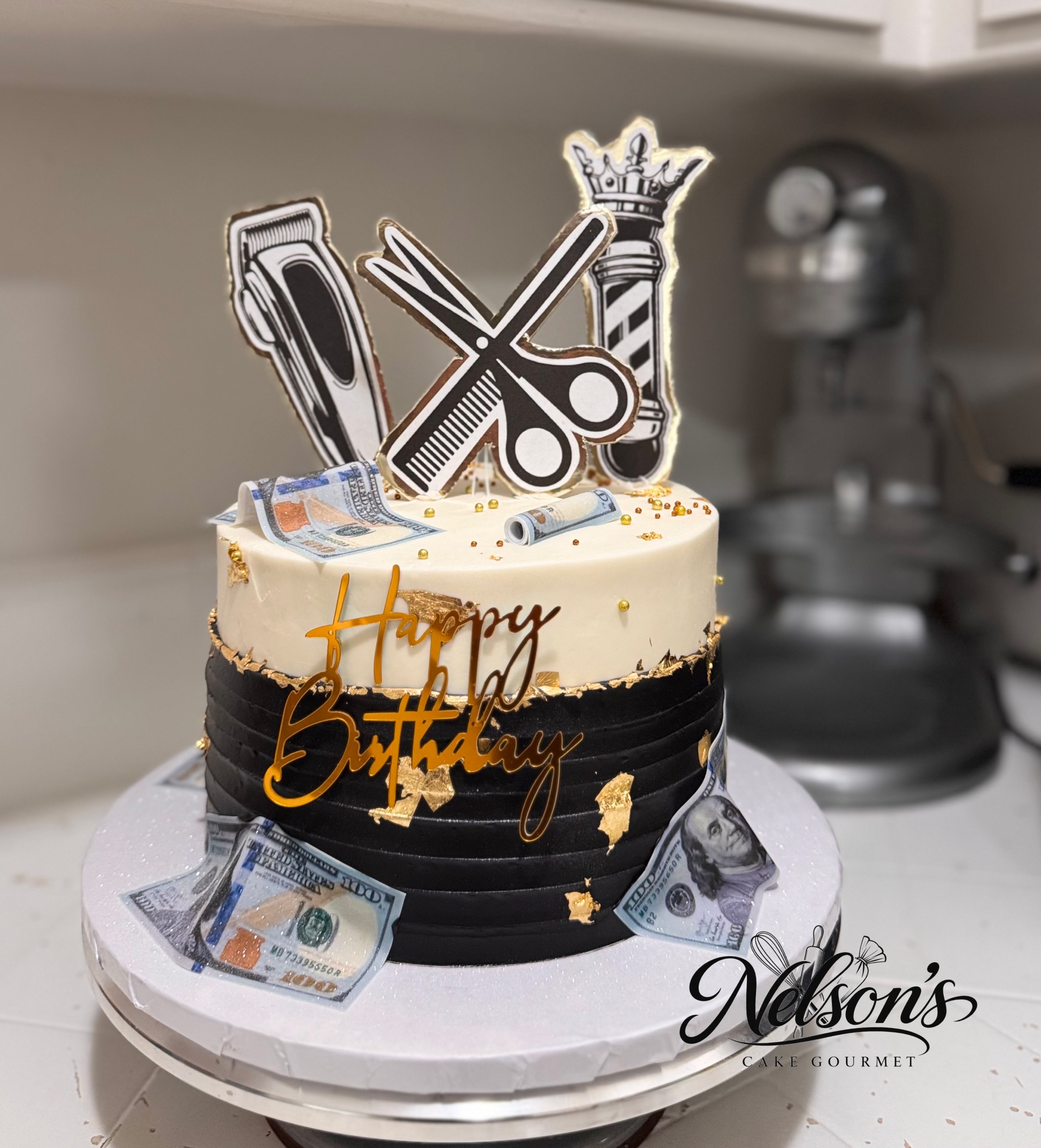 Black and gold barber-themed birthday cake