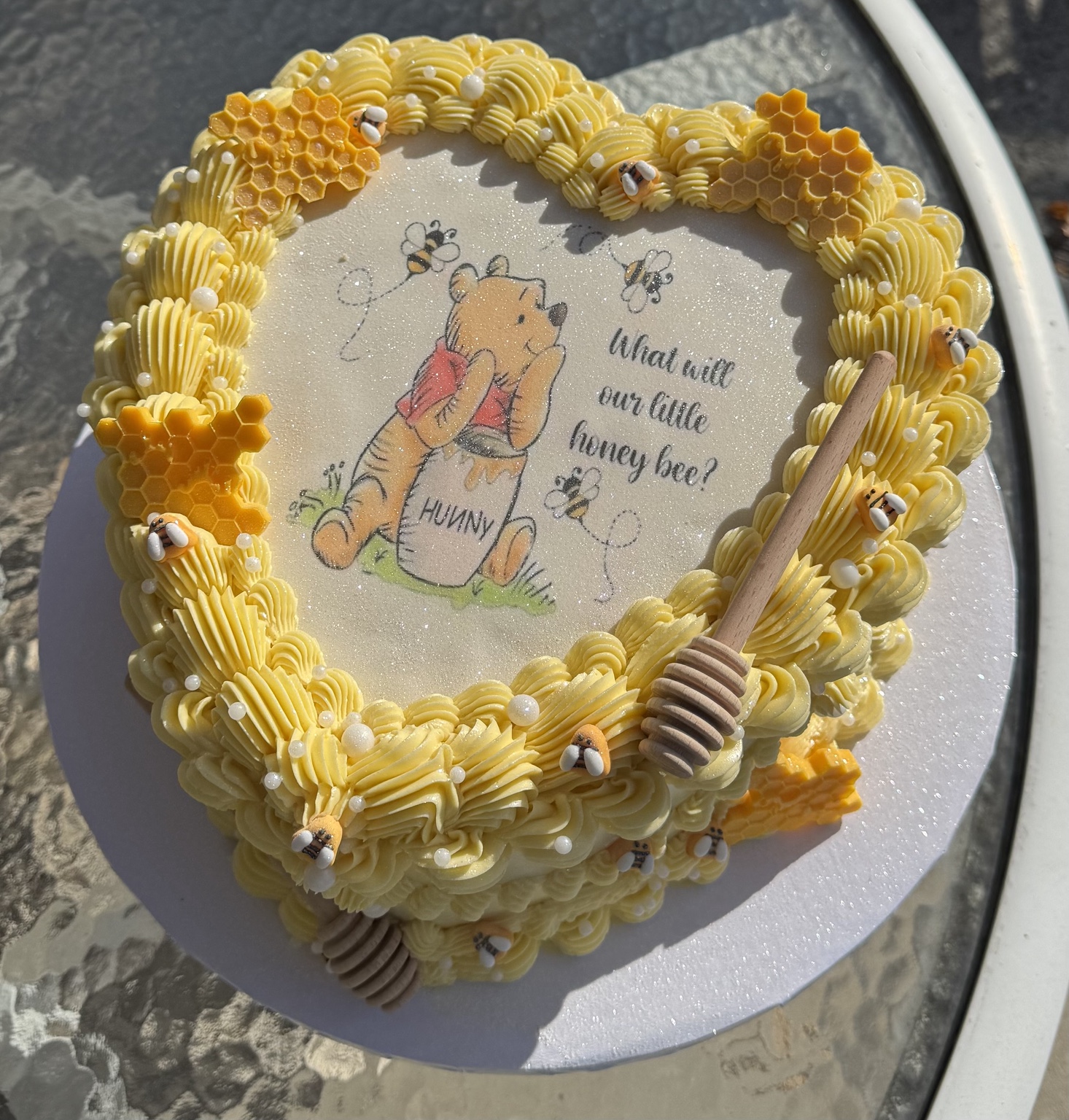 Yellow honey bee themed cake with piped buttercream